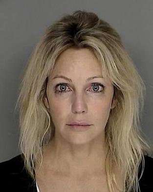 Heather Locklear Mug Shot. A resident reported Heather was "driving 