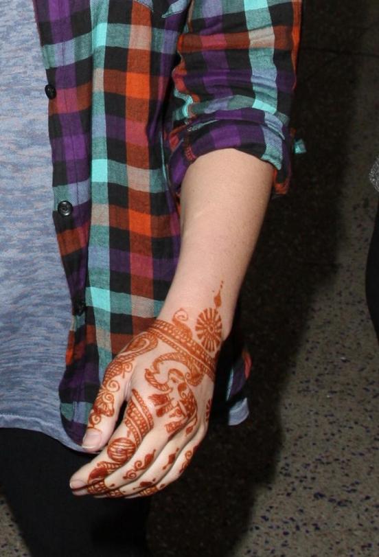 The new tattoo on Jessica Simpson's hand. Those digits used to totally work 