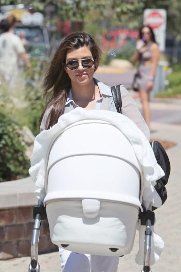 Kourtney Kardashian with a Stroller