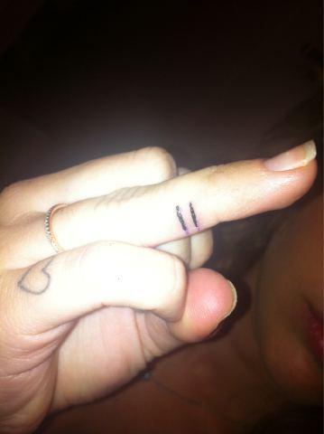 Miley Cyrus Finger Tattoo