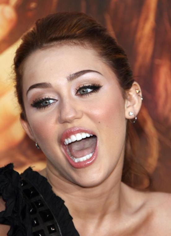 FARKcom 6085286 Miley Cyrus suing over Finally Miley love doll 