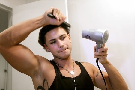 Pauly D puts some serious time into that hair Hey a dude's gotta look good