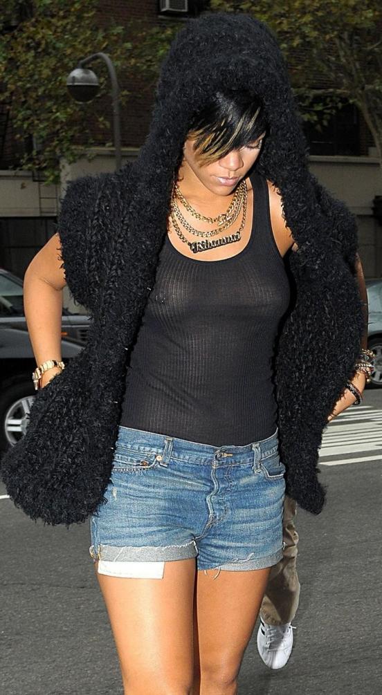Another picture of Rihanna's nipple ring. Awesome.
