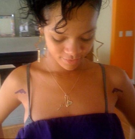 Rihanna got some hot new tattoos - of matching guns - in L.A. in March 2009.
