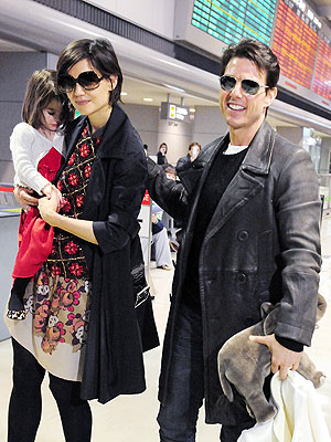 tom cruise and katie holmes. Tom, Katie and Suri are seen
