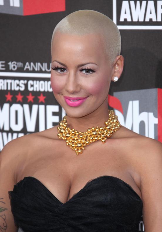amber rose with long hair pictures. Amber Rose hates long hair.