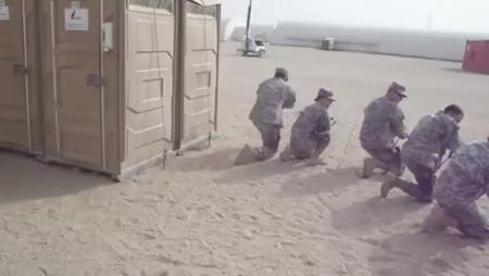 Military Police Clear the Porta-John