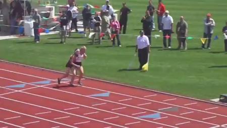 Runner Helps Injured Rival Across Finish Line